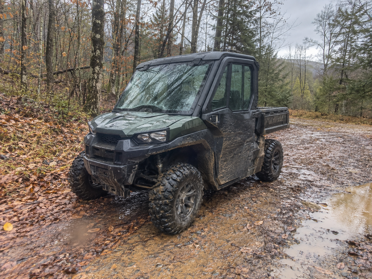 Customer UTV on a forest trail